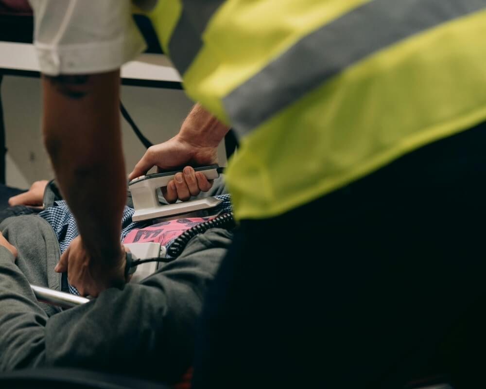 Group practising CPR and AED skills during a CPR1 onsite CPR, AED and First Aid class
